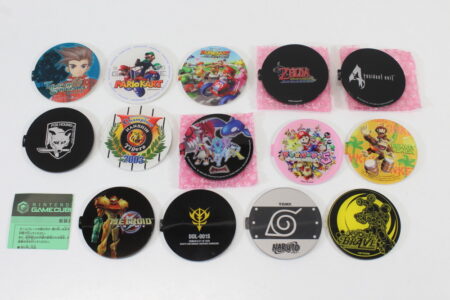 Lot of 14 Nintendo OEM GameCube Jewel Name Plate Zelda Wind Waker Mario Kart Pokemon Colosseum Medarot BRAVE Donkey Konga Hanshin Tigers Gundam Char Metal Gear Solid Tales of Symphonia Mario Party 5 Metroid Prime Resident Evil 4 Naruto (A)
