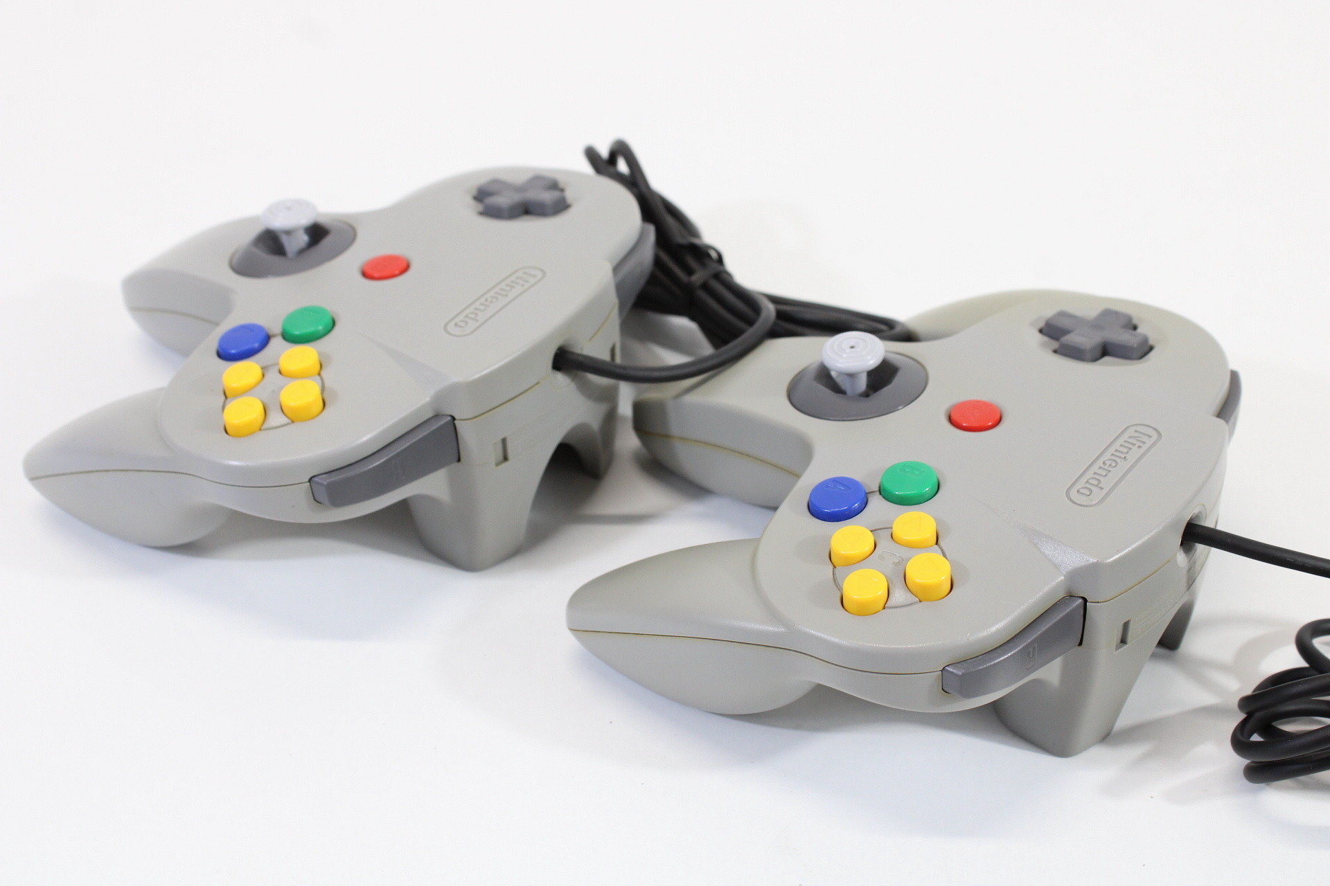 Lot of 2 Official Nintendo 64 Controllers Gray 7/10 Tight Stick (Discolored / Cosmetic Wears) N64
