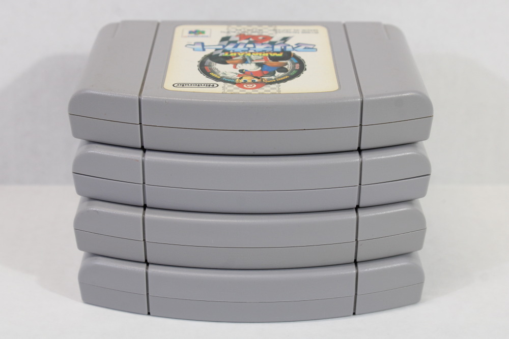 Lot of 4 Mario Kart 64 Mario Party 2 Pokemon Stadium Tamagotchi (B) Nintendo 64 N64